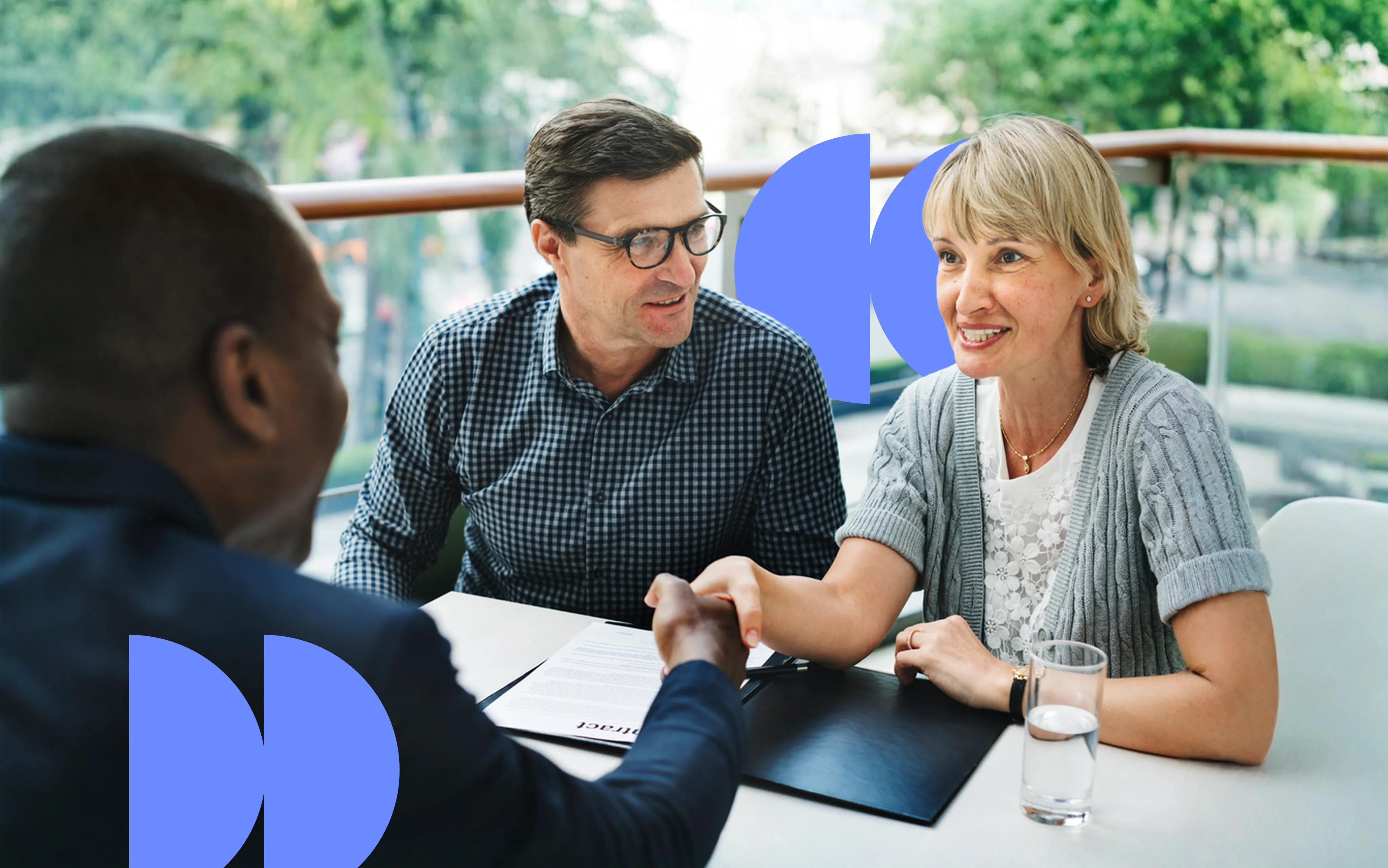 Insurance broker consulting with clients